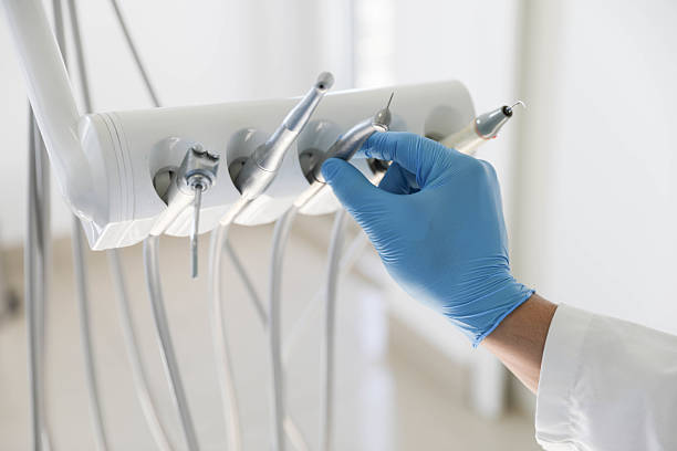 Professional Invisalign Clear Aligners technician working in Beechwood, MI